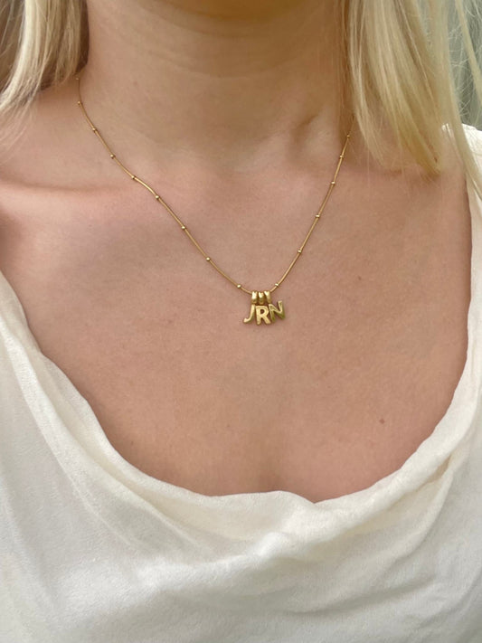 Gold letter necklace with all letters, waterproof jewellery.