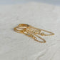 Gold earrings with elegant chain attached 