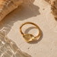 A shell ring with engraving of OCEAN inside