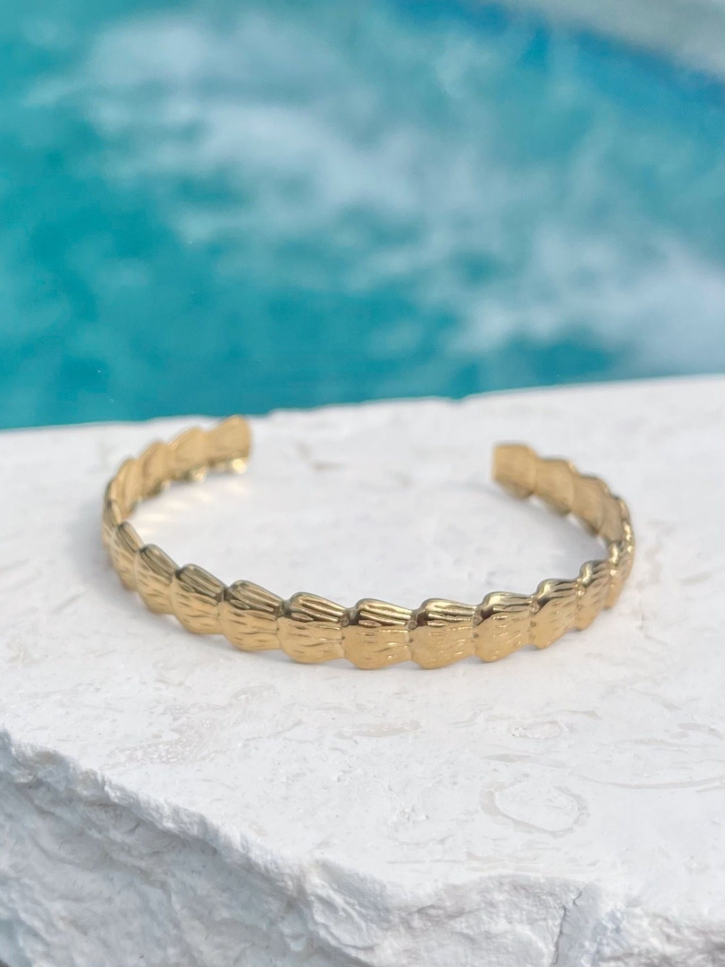 Gold shell cuff bracelet inspired by the ocean, waterproof jewellery. 