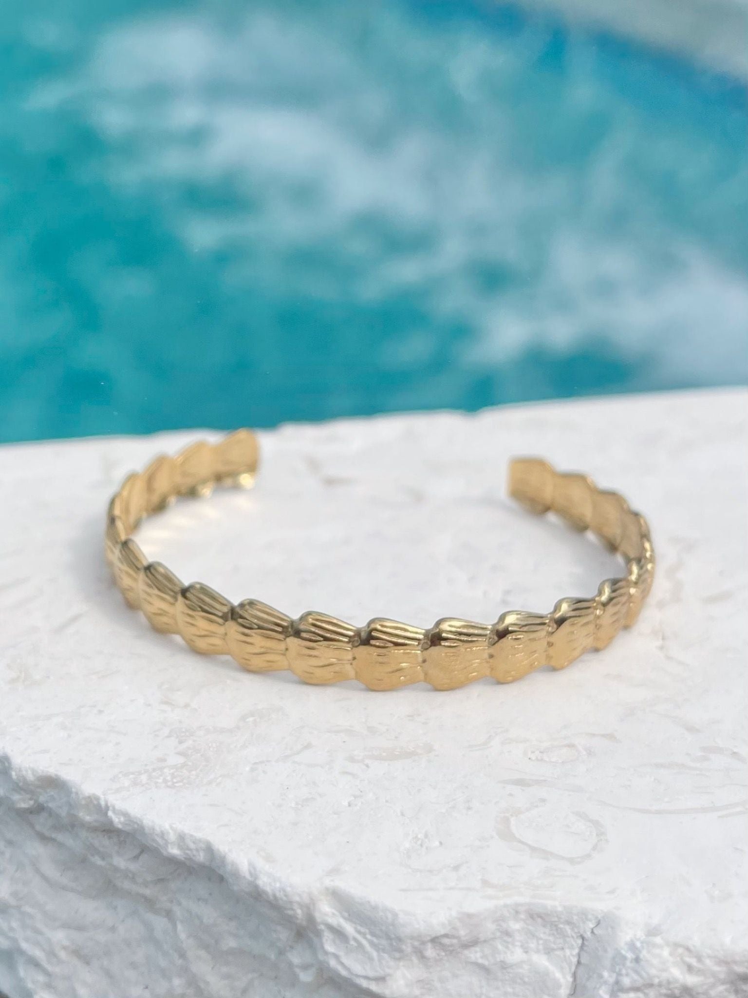 Gold shell cuff bracelet inspired by the ocean, waterproof jewellery. 